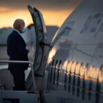 Joe Biden, the Democratic presidential nominee, boards a flight in Atlanta, on Tuesday, Oct. 27, 2020. (Erin Schaff/The New York Times)