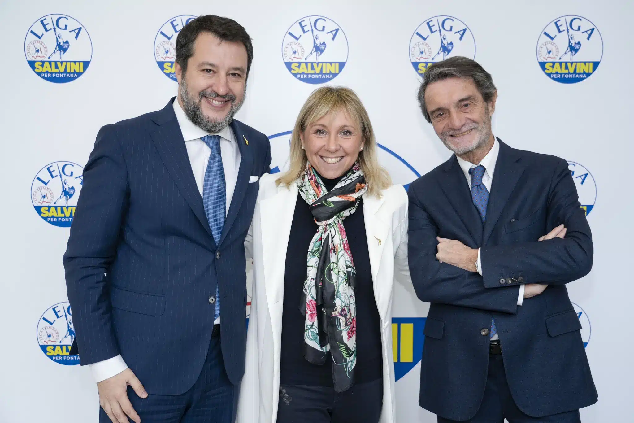 Stefania Zambelli tra il leader della Lega Matteo Salvini e il governatore della Regione Lombardia