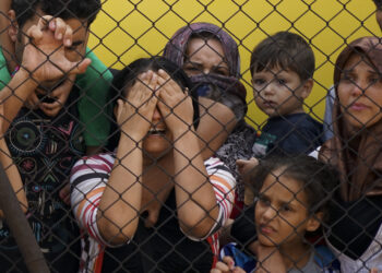 Women and children among Syrian refugees striking at the platform of Budapest Keleti railway station. Refugee crisis. Budapest, Hungary, Central Europe, 4 September 2015.
