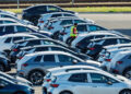 Employees load and unload Volkswagen cars at the plant's premises in Zwickau, eastern Germany on October 28, 2024, after auto giant Volkswagen announced plans to close at least three factories in Germany and slash tens of thousands of jobs as part of drastic cost-savings drive. The plan laid out by management, which affects the namesake VW brand, also includes a 10-percent pay cut for all staff, the company's powerful works council said in an update to staff. (Photo by JENS SCHLUETER / AFP)