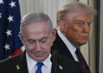 US President Donald Trump and Israeli Prime Minister Benjamin Netanyahu (L) arrive for a press conference in the State Dining Room of the White House in Washington, DC on September 29, 2025 (Photo by ANDREW CABALLERO-REYNOLDS / AFP)
