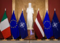 Italian, EU, NATO and Latvian flags are lined up ahead of the mmeeting of the Italian and Latvian Prime Ministers in Riga on July 10, 2023. (Photo by Gints Ivuskans / AFP)