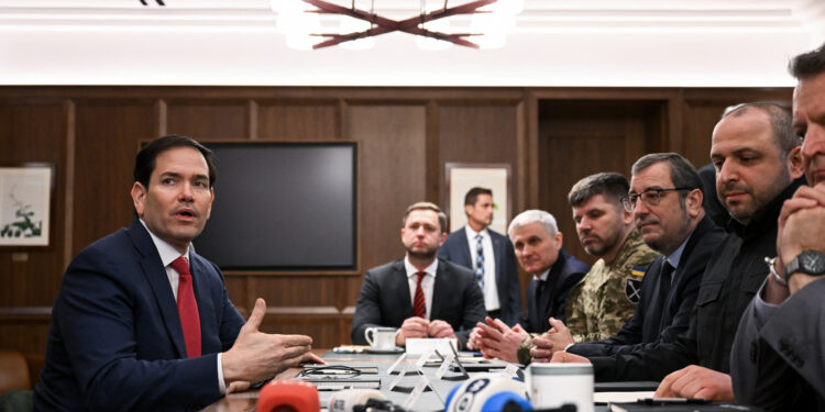 US Secretary of State Marco Rubio (L) speaks during a meeting with Ukrainian officials headed by Secretary of the National Security and Defense Council of Ukraine Rustem Umerov (R) in Hallandale Beach, Florida on November 30, 2025. (Photo by CHANDAN KHANNA / AFP)