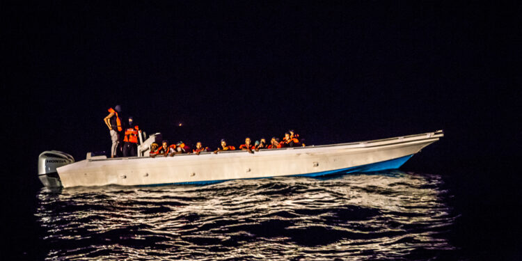 August 4, 2024, Italy: A boat carrying 47 people from Bangladesh and Syria plus two others who appeared to be smugglers, they drove the boat away again and were found in the Central Mediterranean. More than 30,000 people have died or gone missing in the Mediterranean Sea since 2014 while trying to reach Europe, according to figures collected by the International Organisation for Migration. (Credit Image: © Sally Hayden/SOPA Images via ZUMA Press Wire)