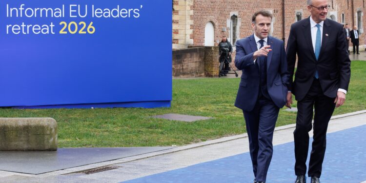 French President Emmanuel Macron, German Chancellor Frierdrich Merz and pictured prior to an informal meeting of the Heads of State or Government of the European Union, in the Landcommanderij Alden Biesen, in Bilzen, Belgium Thursday 12 February 2026. BELGA PHOTO BENOIT DOPPAGNE (Photo by BENOIT DOPPAGNE/Belga/Sipa USA)