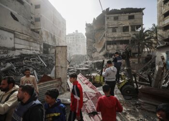 [Photo by Omar Ashtawy/APAImages/Shutterstock (16497571m), via IPA agency].
Palestinians inspect the damaged and largely destroyed building after the Israeli army targeted it in Nasser neighborhood of Gaza City, Gaza on January 31, 2026. At least 29 Palestinians were killed at dawn on Saturday in a series of Israeli airstrikes targeting various areas across the Gaza Strip. Since ceasefire took effect in early October, Israeli actions have killed more than 524 Palestinians.
Palestinians inspect the damaged and largely destroyed building after the Israeli army targeted it in Nasser neighborhood, Gaza city, Gaza Strip, Palestinian Territory - 31 Jan 2026