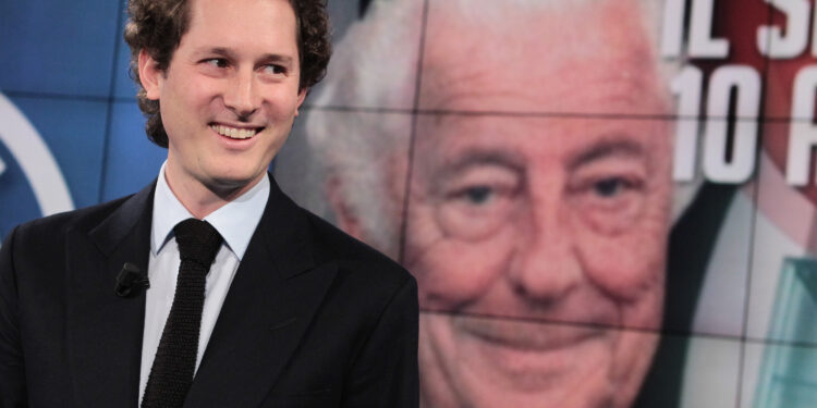 John Elkann, sullo sfondo Gianni Agnelli. Gennaio 2013. Source: Imagoeconomica