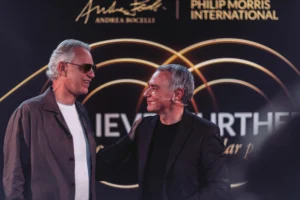 Massimo Andolina, presidente della Regione Europa di Philip Morris, e il Maestro Andrea Bocelli alla presentazione della piattaforma 'Believe. Further' a Venezia il 26 giugno 2026. Source: Philip Morris International