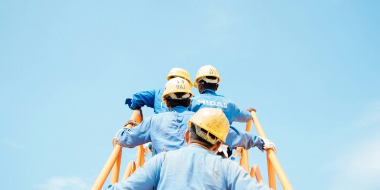 Lavoratori via Unsplash. Photo de solsur Unsplash